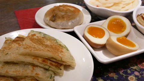 Motion of appetizers on table inside Chinese restaurant with 4k resolution. 스톡 동영상 97599781