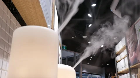 Motion of aroma oil diffuser on display sale rack at Burnaby shopping mall Stock Footage 89739127