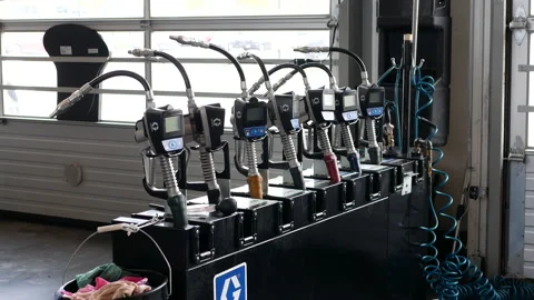 The motion of auto express line inside a Canadian tire store Stock Footage 203444779