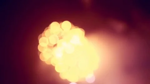 Motion background of defocused fireworks at night with colored bokeh sparkles Stock Footage 85269899