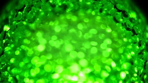 Motion Background of Rotating Green Orbs Stock Footage 70320269