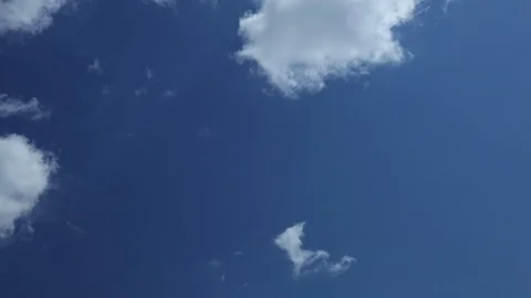 Motion Background. White Clouds Flying On Blue Sky Stock Footage 112059304