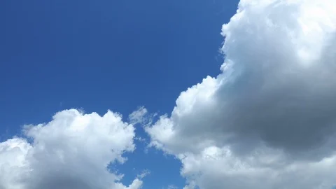 Motion Background. White Clouds Flying On Blue Sky Stock Footage 112059560