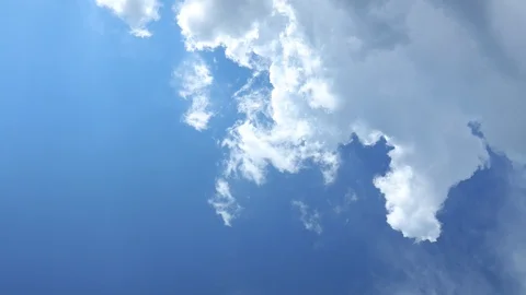 Motion Background. White Clouds Flying On Blue Sky Stock Footage 112207404