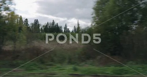 Motion blur background side view of mixed rural landscape in early autumn from Stock Photos