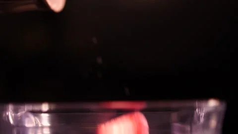Motion blur capture of fruit falling into a blende Video stock 153755136