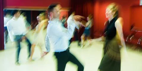 Motion blur of dancing couples Stock-Fotos