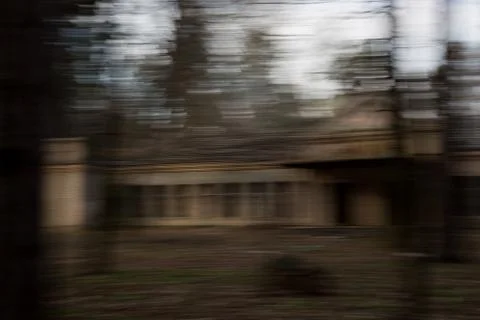 Motion blur house running from problems mental health horror scene Stock Photos