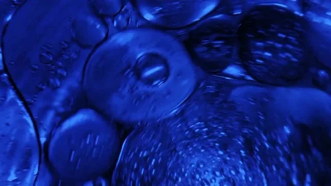 Motion blur liquid mix drop oil water blue concept. Video stock 152385356