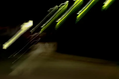 Motion blur long exposure neon city lights at night Stock Photos