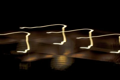 Motion blur long exposure neon city lights at night Stock Photos