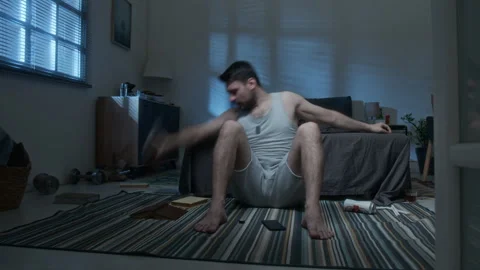 Motion Blur Man Drinking Alcohol in Dark Room Stock Footage 311500735
