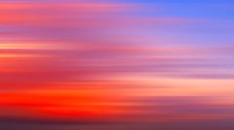 Motion blur panoramic landscape of bright red orange sunrise sunset, abstract Illustrazione stock