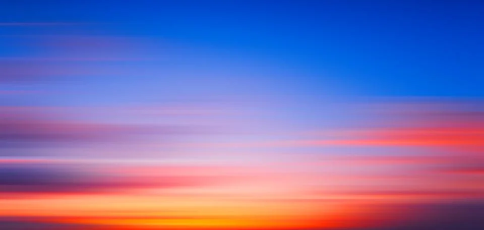 Motion blur panoramic landscape of bright red orange sunrise sunset, abstract Illustrazione stock