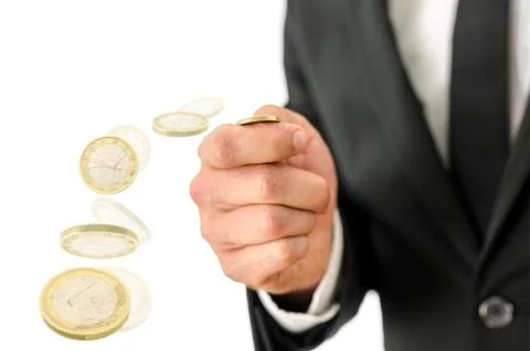 Motion blur of tossing a coin Stock Photos