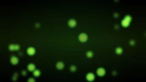 Motion of Bright Green Particles in Dynamic Dark Background for Visual Effect Stockbeeldmateriaal 342741320