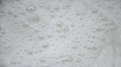 Motion Bubbles occur from shampoo Video stock 63184765