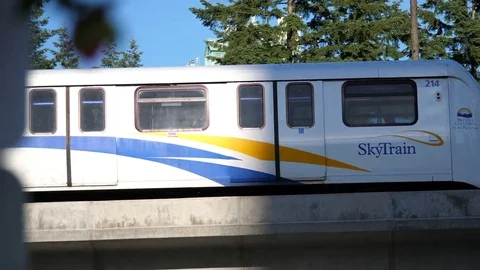 Motion of camera chasing skytrain driving to a station Stock Footage