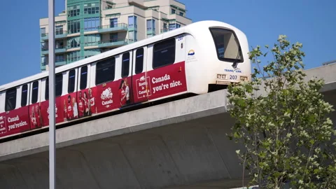 The motion of camera chasing Skytrain left the station Video stock 205750694