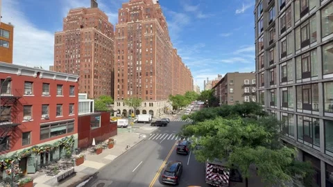Motion of cars traffic on intersection. View from High Line park. New York City 動画素材 337478841
