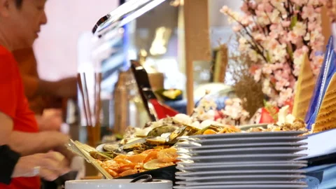 Motion of chef preparing food for customer at seafood area Stock Footage 97041741