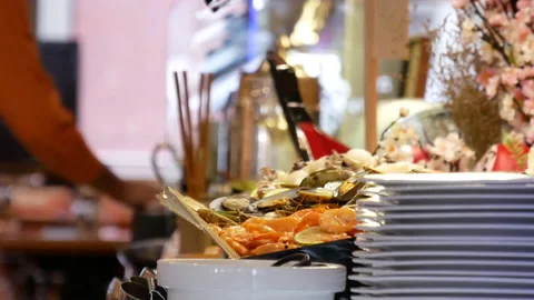 Motion of chef preparing food for customer at sushi area inside restaurant 스톡 동영상 97078098