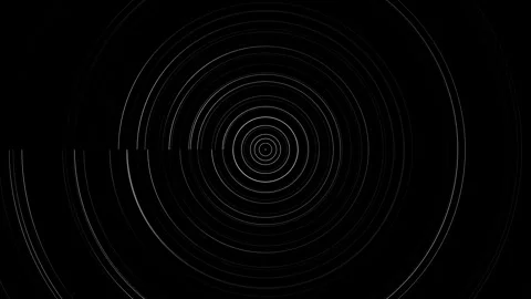 Motion of circles in concentric patterns on a dark Stock Footage 339358515