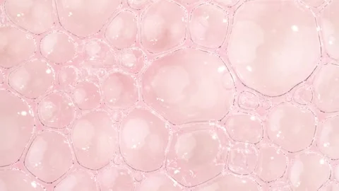 Motion of clear pink molecules, macro. Cosmetic bubbles, rotation. Stock Footage 297249381