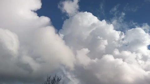 Motion clouds in blue sky rolling, Towering Cumulus Cloud Stock Footage 112361020
