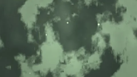 Motion of clouds in the night sky with glowing stars nearby Stock Footage 338226083