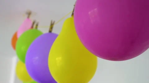 Motion of colored balloons hung for the celebration Vidéo 221132477