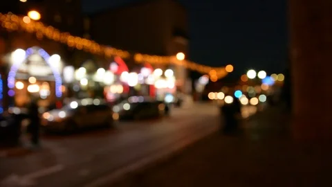 Motion of colorful diffused blurred and defocused twinkling light of city trafic 動画素材 100145737