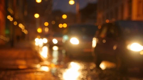 Motion of colorful diffused blurred and defocused twinkling light of city trafic Stock Footage 106268795