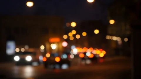 Motion of colorful diffused blurred and defocused twinkling light of city trafic Stock Footage 106268906