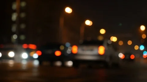 Motion of colorful diffused blurred and defocused twinkling light of city trafic Stock Footage 108517292