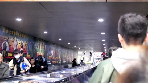 Motion of commuters taking escalator for going to MRT platform Video stock 83930325