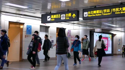 Motion of commuters walking inside MRT station during rush hour in Taipei Taiwan 스톡 동영상 85776355