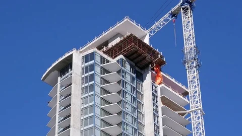 Motion of construction of new high-rise building in city with 4k resolution Video stock 74215205