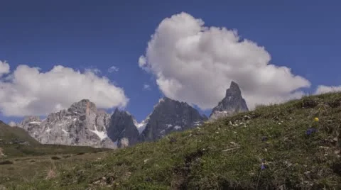 Motion control time lapse of clouds shifting above mountain peaks Stock Footage 68332339