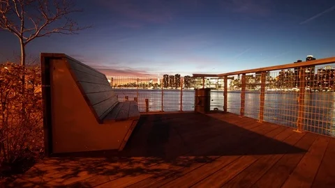 Motion Control Time-lapse of Sunset by the East River and NYC Stock Footage 84327802