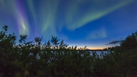 Motion control timelapse of northern lights over Alaskan lake Video stock 91323646