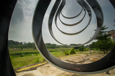 Motion control timelapse pan slide sculpture bishan park singapore Stock Footage 155629835