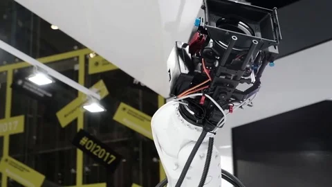 Motion Control. Video camera mounted on the robotic arm performs video shooting Stock Footage 81457503