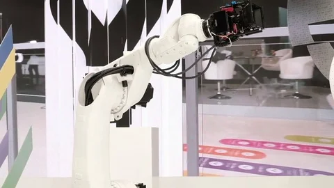 Motion Control. Video camera mounted on the robotic arm performs video shooting Stock Footage 81457520