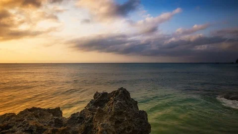 Motion controlled time-lapse beach at sunset cape Maeda Okinawa Japan Stock Footage 123942339