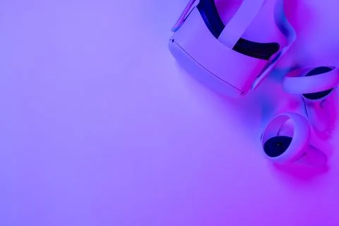 Motion controllers by VR glasses on desk Stock Photos