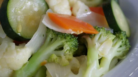 The motion of cooked vegetable on a plate Video stock 209868315