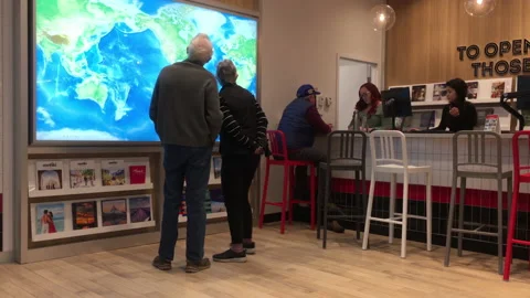 Motion of couple watching map and finding place to travel Stock Footage 102593076