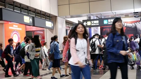 Motion of crowd getting in and out of the train in Taipei Taiwan Stock Footage 81805592