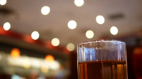 Motion of cup of hot beverage with steam inside Chinese restaurant Stock Footage 104639981